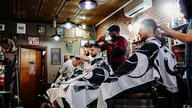 Barbers Cutting Hair